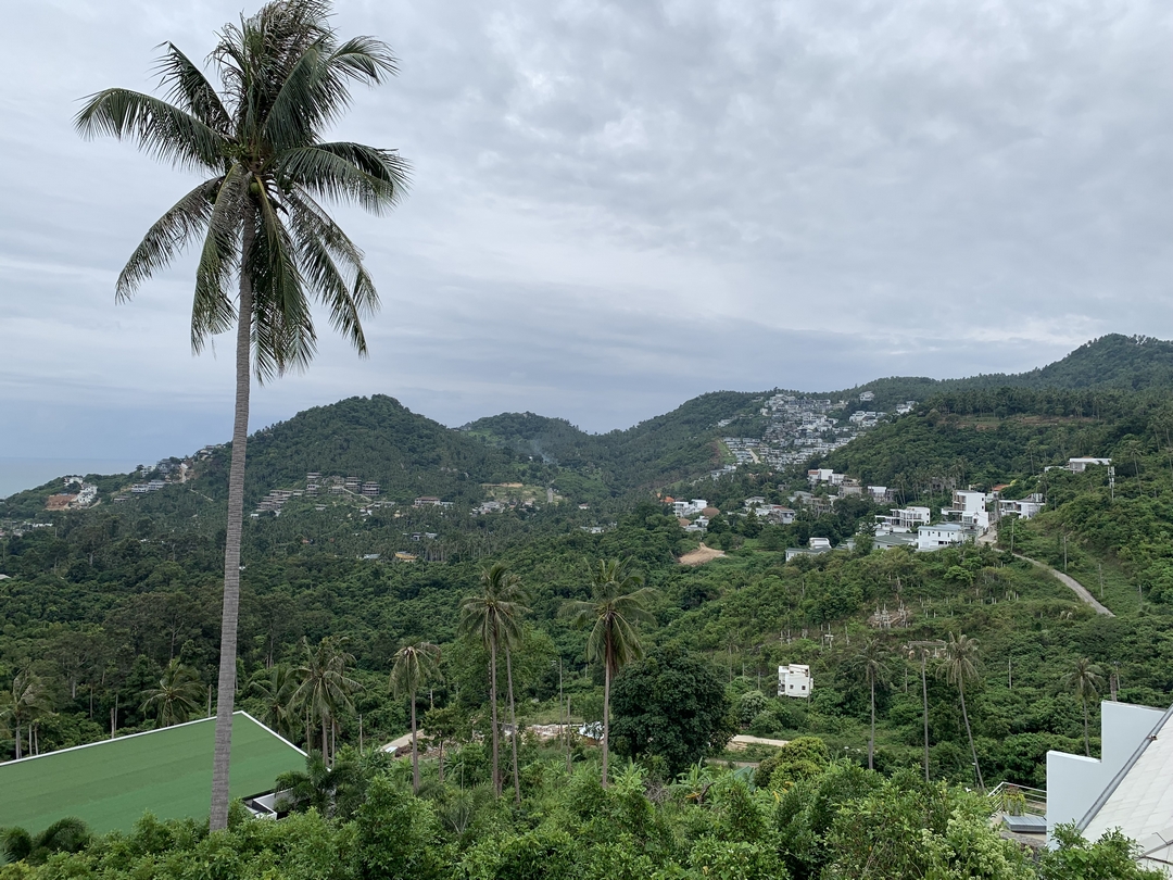 view of the sea and the hill from the balcony of the EDEN studio of Villa Siam